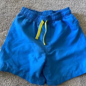 Primary Swim Trunks, Blueberry, size 6-7